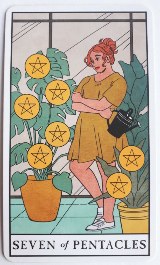 The 7 of Pentacles tarot card from the Modern Witch tarot deck