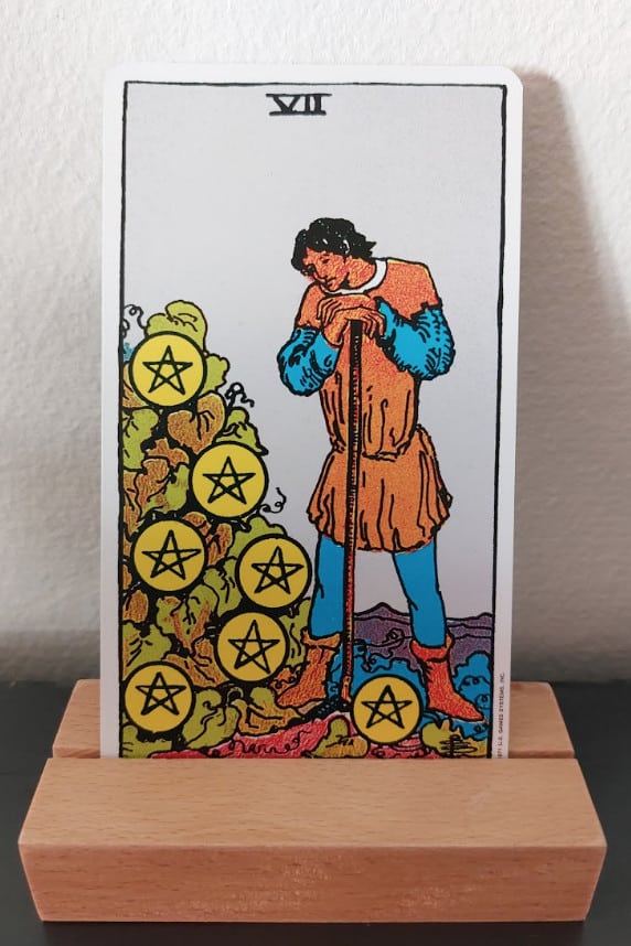 seven of pentacles from the rider-waite tarot deck
