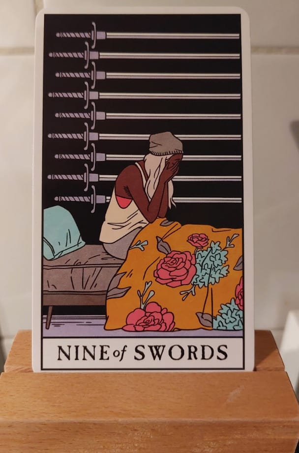 the Nine of Swords tarot card from the Modern Witch tarot deck